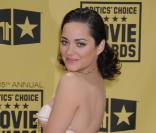 Marion Cotillard a choisi Christian Dior pour l'habiller aux Critics' Choice Awards, à Los Angeles, le 15 janvier 2010 !