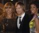 David Guetta entouré de sa femme Cathy et Kelly Rowland aux NRJ Music Awards à Cannes, le 23 janvier 2010 !