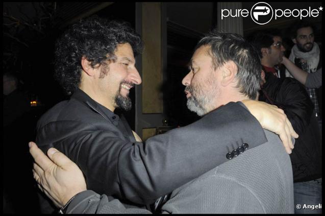 Radu Mihaileanu et Luc Besson à l'occasion de la grande soirée donnée pour les deux millions d'entrées au box-office du Concert, au Ritz Club, à l'Hôtel Ritz, à Paris, le 5 février 2010.