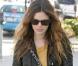 Un peu de couleur pour Rachel Bilson qui a osé la robe moutarde portée sous blouson de cuir court. Une belle silhouette soignée qui lui donne une allure folle. 