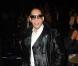 JoeyStarr, a laissé ses son tyle de rappeur au placard : très élégant pour la collection de prêt-à-porter Automne Hiver 2010/2011 de Karl Lagerfeld (7 mars 2010, Paris)