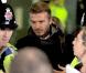 David Beckham lors de son arrivée à l'aéroport de Manchester le 9 mars 2010 pour disputer son match de Ligue des Champions avec le Milan face à son ancien club de Manchester United.