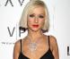Christina Aguilera interprète  Lift me up  lors du téléthon au profit de Haïti