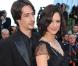 Asia Argento et son mari Michele Civetta lors de la montée des marches de la cérémonie de clôture du Festival de Cannes, le 23 mai 2010