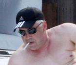 Carlo Ancelotti, entraîneur du club champion d'Angleterre Cheslea et sa compagne Marina Cretu à Miami en Floride le 27 mai 2010