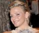 Charlene Wittstock au 60e Bal de la Croix-Rouge, ose le décolleté plongeant et les cheveux en arrière. 1er août 2008 