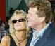 Farrah Fawcett, une drôle dame disparue bien trop tôt le 25 juin 2009 ! Ici, la sublime Farrah Fawcett en compagnie de son homme Ryan O'Neal en 1989 