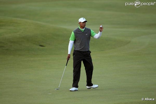Toujours en quête d'un 15e succès dans un tournoi majeur, Tiger Woods peine à retrouver les sommets depuis le scandale de ses infidélités conjugales... Le british Open de Saint Andrews (photo le 16 juillet) ne fait pas exception.