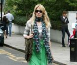 Le top model allemand Claudia Schiffer à la sortie de l'école de ses enfants, le 7 juillet 2010 à Londres 