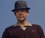 Sean Connery est un James Bond qui joue au golf dans Goldfinger (1964)