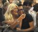 Victoria Silvstedt et Enrico Papi lors du défilé "Miss Bikini" dans le cadre de la Fashion Week de Milan, le 22 septembre 2010