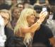 Victoria Silvstedt et Enrico Papi lors du défilé "Miss Bikini" dans le cadre de la Fashion Week de Milan, le 22 septembre 2010
