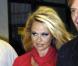 Pamela Anderson quitte son luxueux hôtel, à Athènes (Grèce), vendredi 24 septembre.