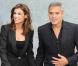 Elisabetta Canalis et George Clooney au défilé Giorgio Armani à Milan le 27 septembre 2010
