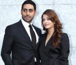 Aishwarya Rai et son époux Abhishek Bachchan       au défilé Giorgio Armani à Milan le 27 septembre 2010
