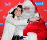Karine Ferri et le père Noël à la soirée du Train de Noël le 15 décembre 2010