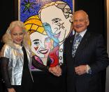 Du 17 au 20 décembre 2010, l'artiste brésilien résidant à Miami Romero Britto présente d'étonnants portraits au Carrousel du Louvre. Buzz Aldrin et sa femme Lois devant leur portrait. 