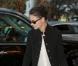 Tom Cruise et Katie Holmes arrivent à l'hôtel Plaza avec leur fille Suri, court vêtue par -4°C, lundi 20 décembre, à New York.