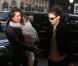 Tom Cruise et Katie Holmes quittent l'hôtel Plaza avec leur fille Suri, court vêtue par -4°C, lundi 20 décembre, à New York.