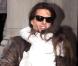 Tom Cruise et Katie Holmes quittent l'hôtel Plaza avec leur fille Suri, court vêtue par -4°C, lundi 20 décembre, à New York.