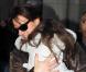 Tom Cruise et Katie Holmes quittent l'hôtel Plaza avec leur fille Suri, court vêtue par -4°C, lundi 20 décembre, à New York.