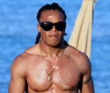Edgar Davids profite du soleil de Miami, en compagnie d'amis, le 22 décembre 2010