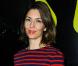 Sofia Coppola cultive son allure garçon manqué avec une marinière, mais n'oublie pas la touche chic avec des boots Louis Vuitton, à la première de Somewhere à Paris, le 4 novembre 2010.