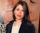 Sofia Coppola porte la veste d'homme avec un jean pour une allure décontractée. Sa touche féminine ? Une veste en velour à Los Angeles, le 13 décembre 2000.