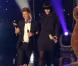 Thomas (ici avec Benoît et René la taupe) lors NRJ Music Awards le 22 janvier 2011 : silhouette presqu'élancée !
