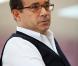 Jean-Luc Delarue repond a des lyceens sur les risques de l'addiction aux drogues lors d'une etape a Tourcoin, France, le 11 mars 2011, dans le cadre de son tour de France en camping-car, visant a sensibiliser les jeunes aux dangers de l'addiction.
