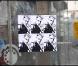 Les affichettes placardées près du restaurant parisien où John Galliano aurait tenu des propos antisémistes et racistes. Photos prises le mecredi 2 mars 2011.
