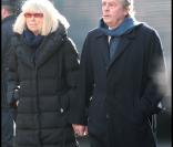 Mireille Darc et Alain Delon lors des obsèques d'Annie Girardot à Paris le 4 mars 2011