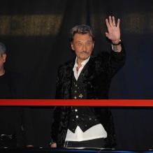 Johnny Hallyday présente son album Jamais Seul, au Virgin Megastore des Champs-Elysées, à Paris. 27/03/2011