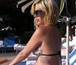 Tori Spelling enceinte, à Palm Springs, avec son tatouage dédié à son mari Dean, le 3 mai 2011