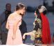 Charlotte Le Bon effectue sa chronique météo devant Lady Gaga, sur le plateau du Grand Journal de Canal +, le 11 mai 2011.