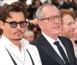 Johnny Depp et Geoffrey Rush lors de la projection de Pirates des Caraïbes, La Fontaine de Jouvence, le samedi 14 mai 2011.