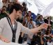 lors du photocall du film Les Hommes libres le 19 mai 2011 à Cannes