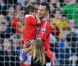 Le champion Ryan Giggs et ses enfants Liberty Beau (8 ans) et Zachary Joseph (5 ans), à Manchester, en mai 2011.