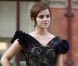 Emma Watson, dans une robe Rafael Lopez et des souliers Chanel, lors du photocall de Harry Potter et les Reliques de la mort -partie II dans la gare Saint Pancras à Londres le 6 juillet 2011
