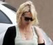January Jones : Enceinte, elle range sa panoplie glamour au placard