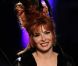 Mylène Farmer défile pour Jean-Paul Gaultier à Paris le 6 juillet 2011.