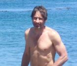David Duchovny et ses enfants à la plage à Los Angeles le 4 juillet 2011