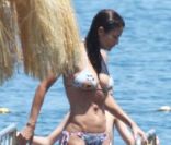 Helena Christensen et son fils Mingus, avec des proches, à Ischia en Italie le 13 juillet 2011 : un corps de déesse à 42 ans 
