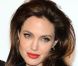 Smoky eyes et rouge à lèvres clinquant, Angelina Jolie était superbe pour la première de son film The Tourist en Italie. Rome, le 15 décembre 2010.