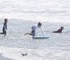 David Beckham à la plage à Malibu avec ses fils Brooklyn, Romeo et Cruz, le 27 août 2011