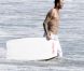David Beckham à la plage à Malibu avec ses fils Brooklyn, Romeo et Cruz, le 27 août 2011