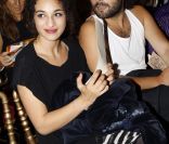 Camélia Jordana et un ami au défilé Jean-Paul Gaultier. 1er octobre 2011