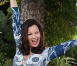 Fran Drescher s'éclate lors du photocall pour promouvoir sa série télévisée Happily Divorced lors du marché international des contenus audiovisuels MIPCOM, à Cannes, le 3 octobre 2011      