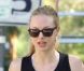Amanda Seyfried fait un jogging avec son chien et son coach sportif dans les rues de Hollywood le 28 octobre 2011