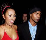 Mel B et on ex-mari Jimmy Gulzar, à Londres, le 7 décembre 1998.